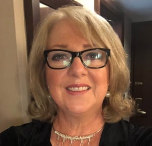 head shot of our CEO Sylvia Tidy Harris