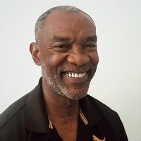 Dudley Stokes smiling at the camera