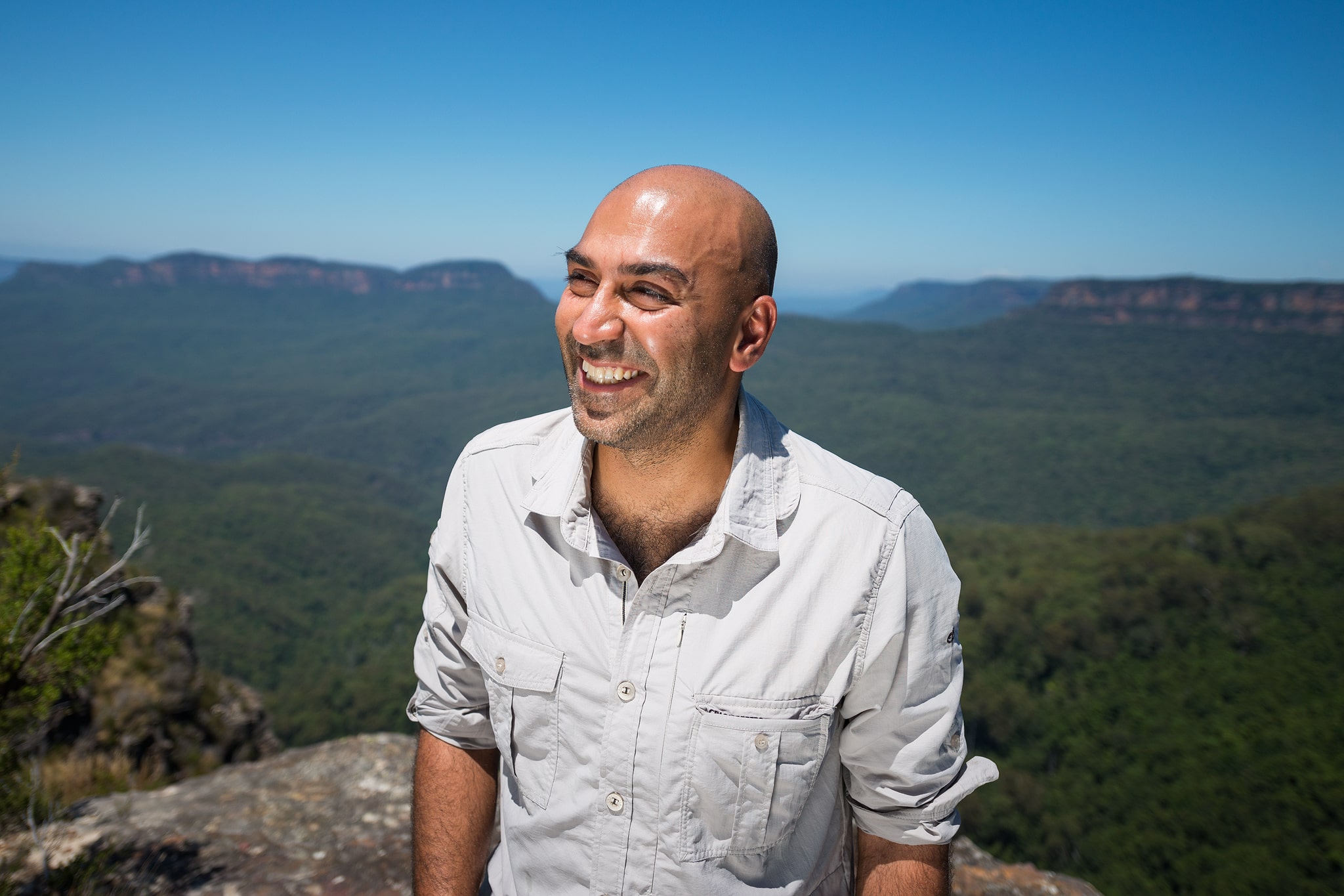 Amar Latif smiling at the camera