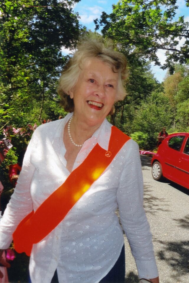Rowena wearing a Red Sash
