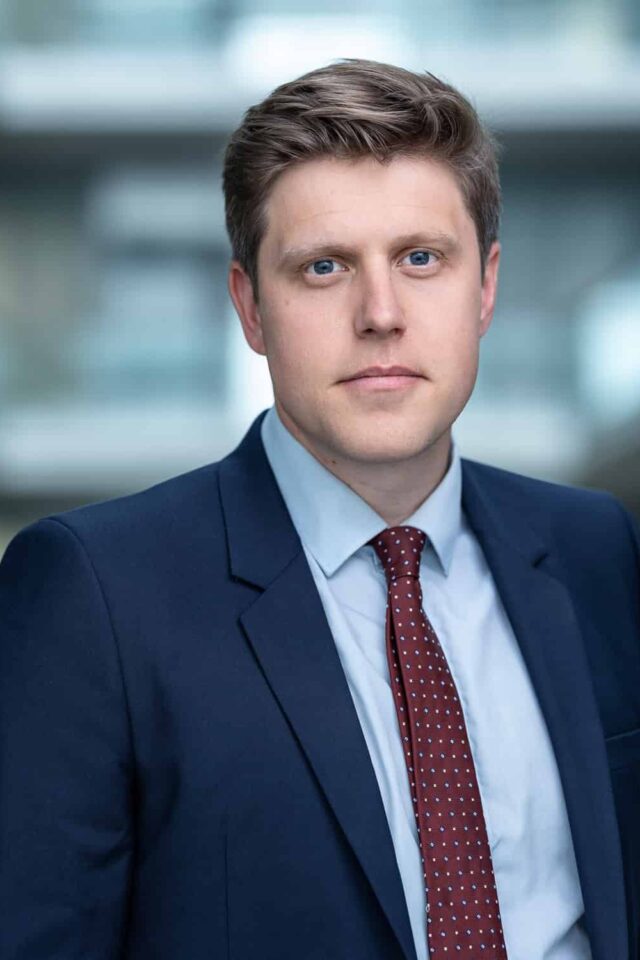 Daniel Hewitt looking at camera