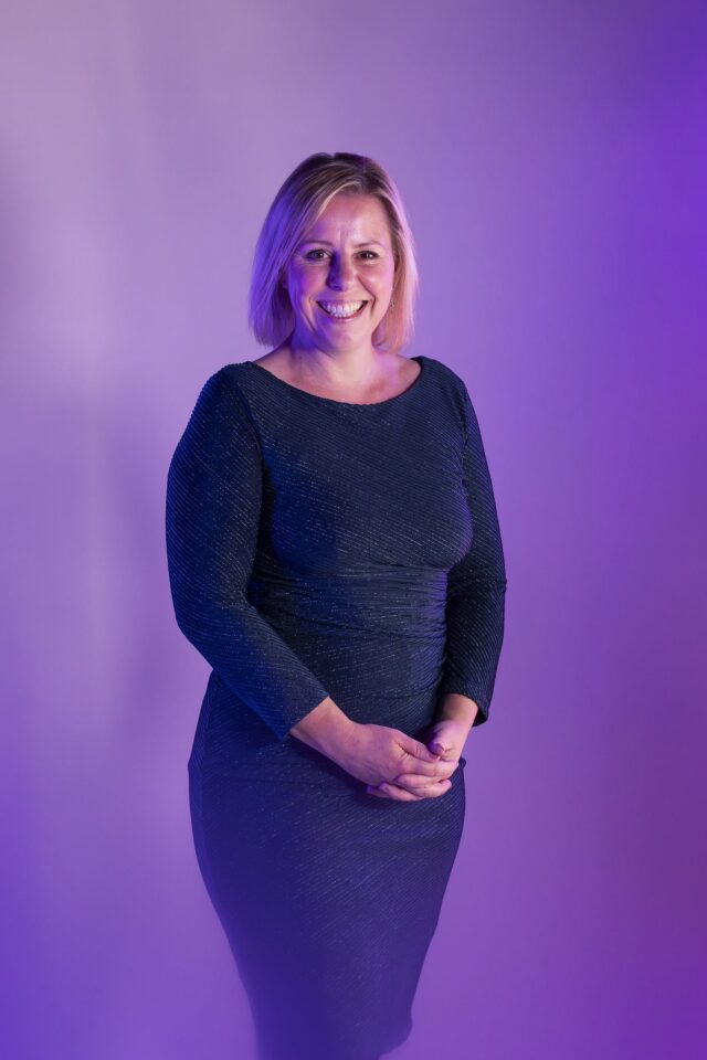 Danni Hewson looking at camera