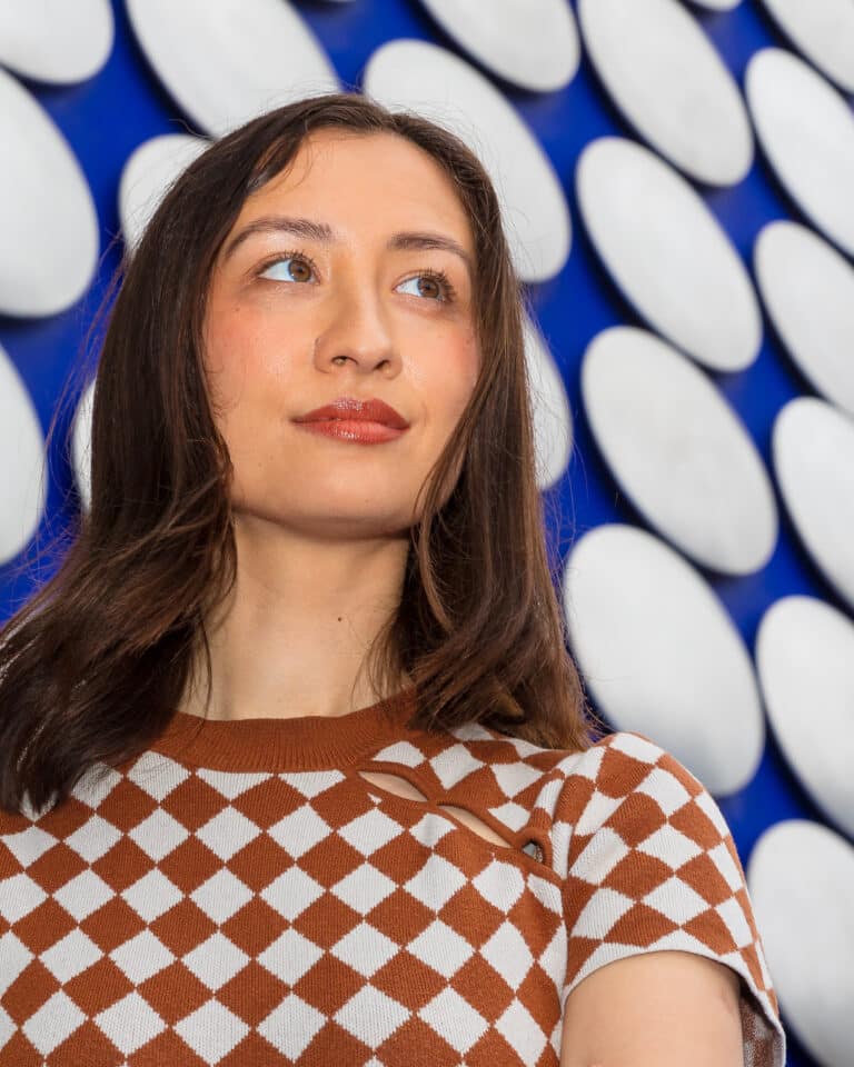 Dr Kerry McInerney (née Mackereth) looking at camera