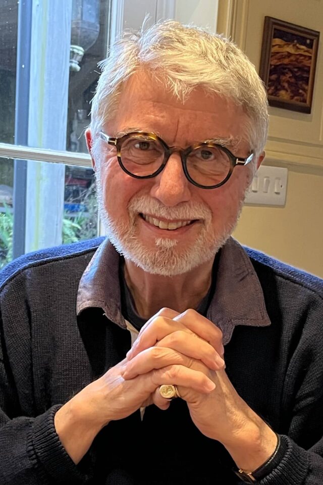 Christopher Joll looking at camera