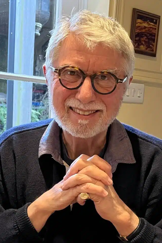 Christopher Joll looking at camera