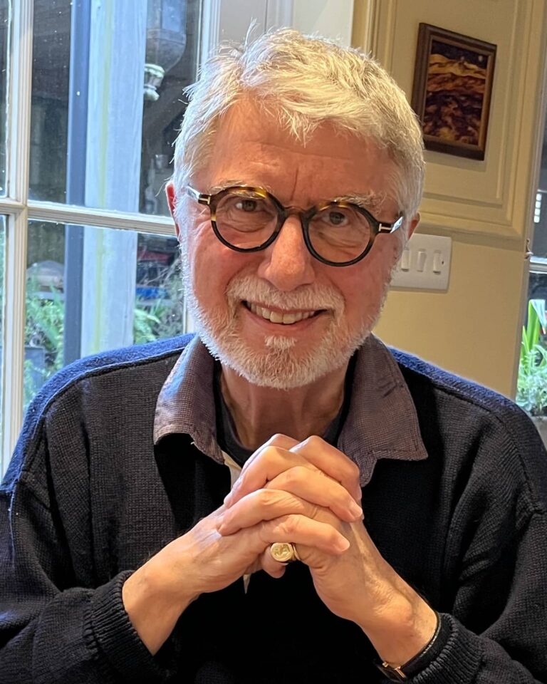 Christopher Joll looking at camera