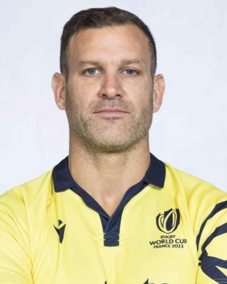 Karl Dickson with arms folded