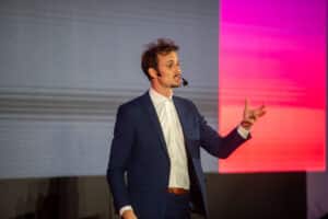 Butzi, HR speaker speaking at the Drive HR Conference 2023