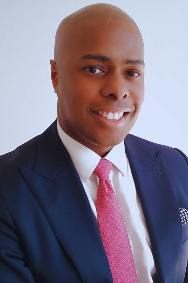 Elemi Atigolo, AI Speaker looking at camera