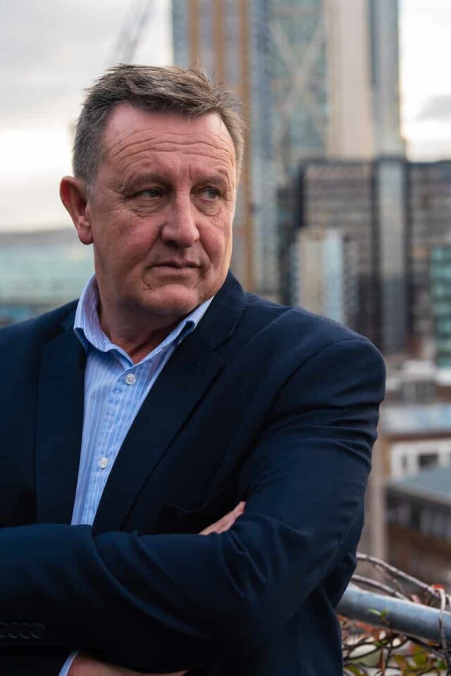 Jeff Dewson Keynote speakers looking at camera