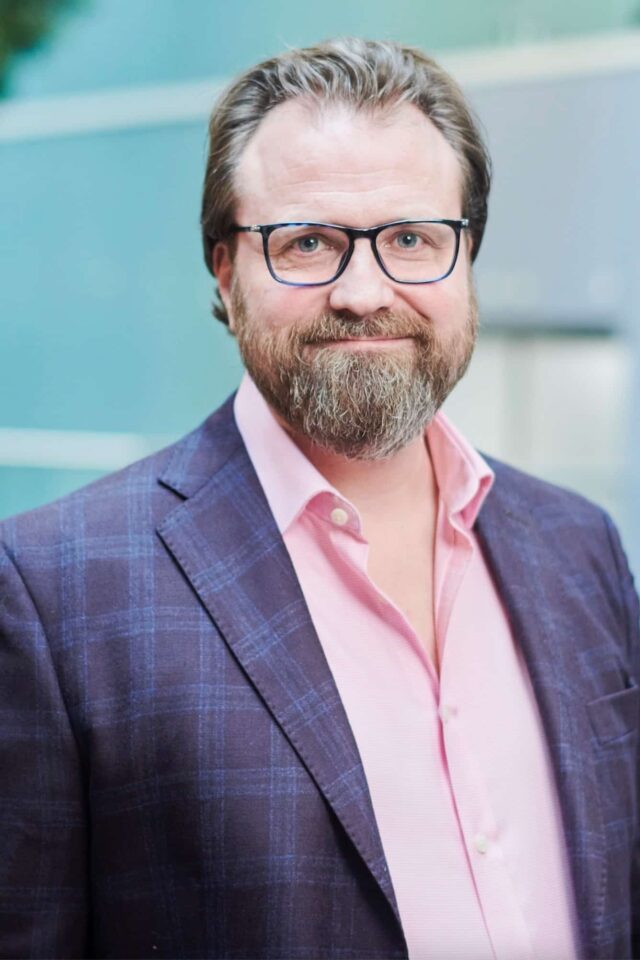 Nick Smallman, keynote speaker looking at camera