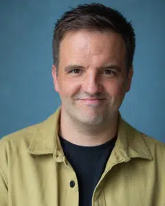 Adam Smith smiling