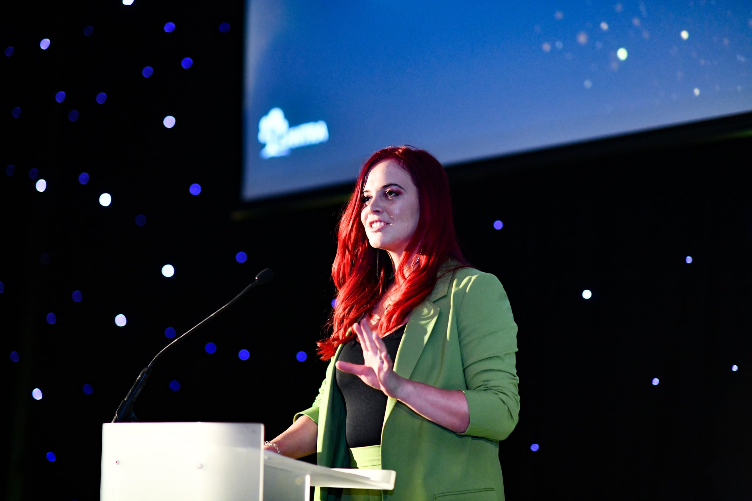The Red Shepherdess Hannah Jackson speaking at an event