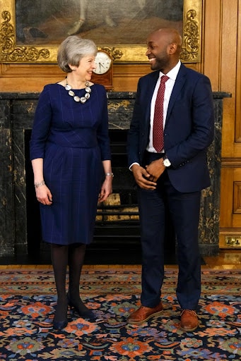richard etienne with theresa may